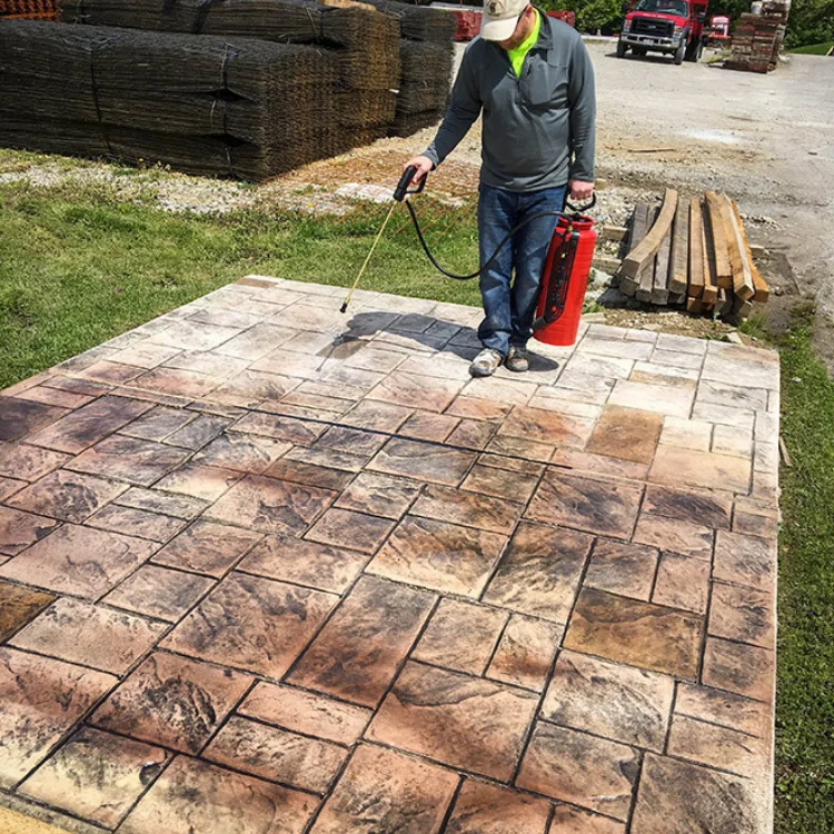 Applying wet look concrete sealer